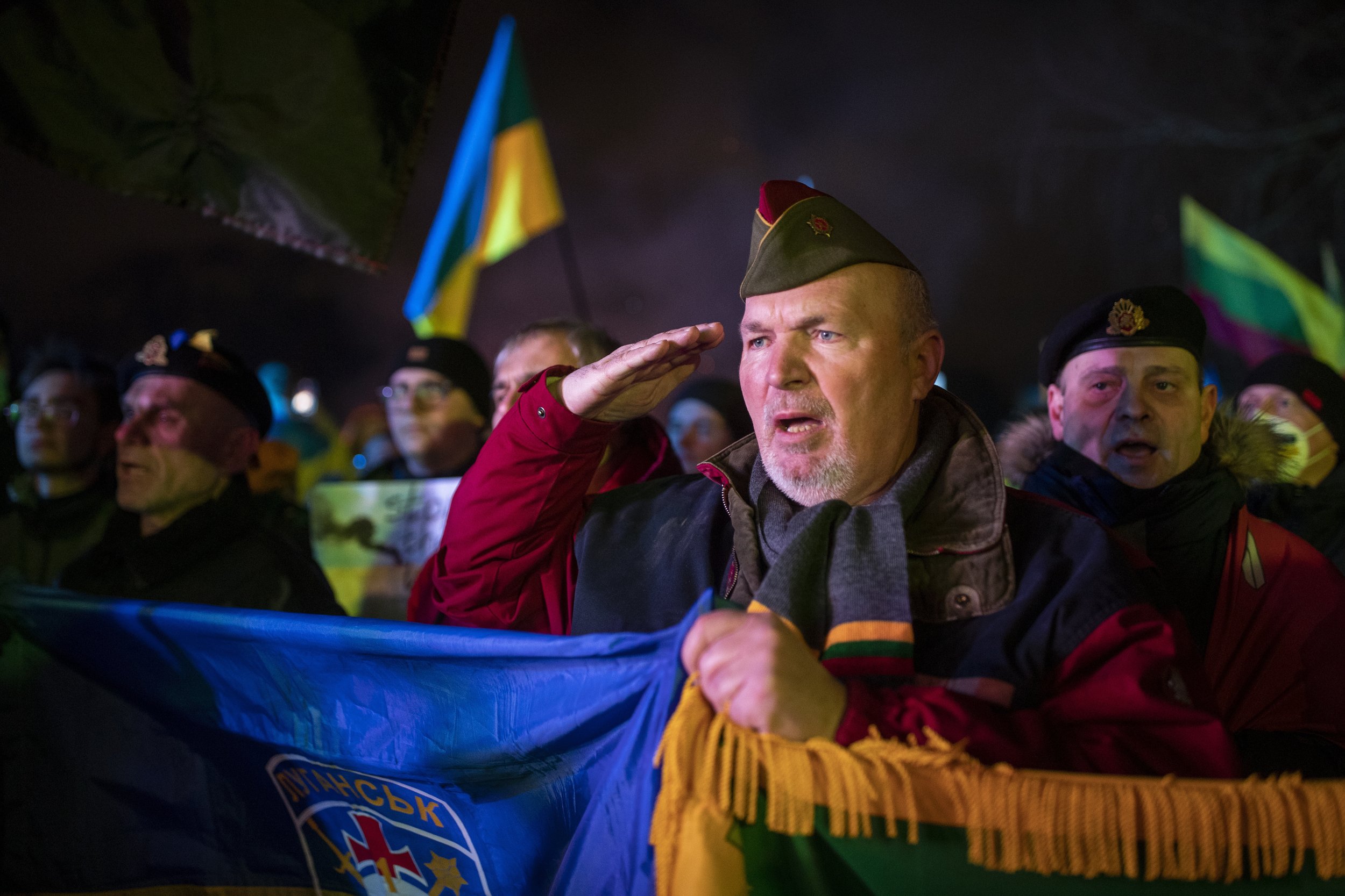  People take part in a protest against Russian invasion of Ukraine, in Vilnius, Lithuania, Thursday, Feb. 24, 2022. (AP Photo/Mindaugas Kulbis) 