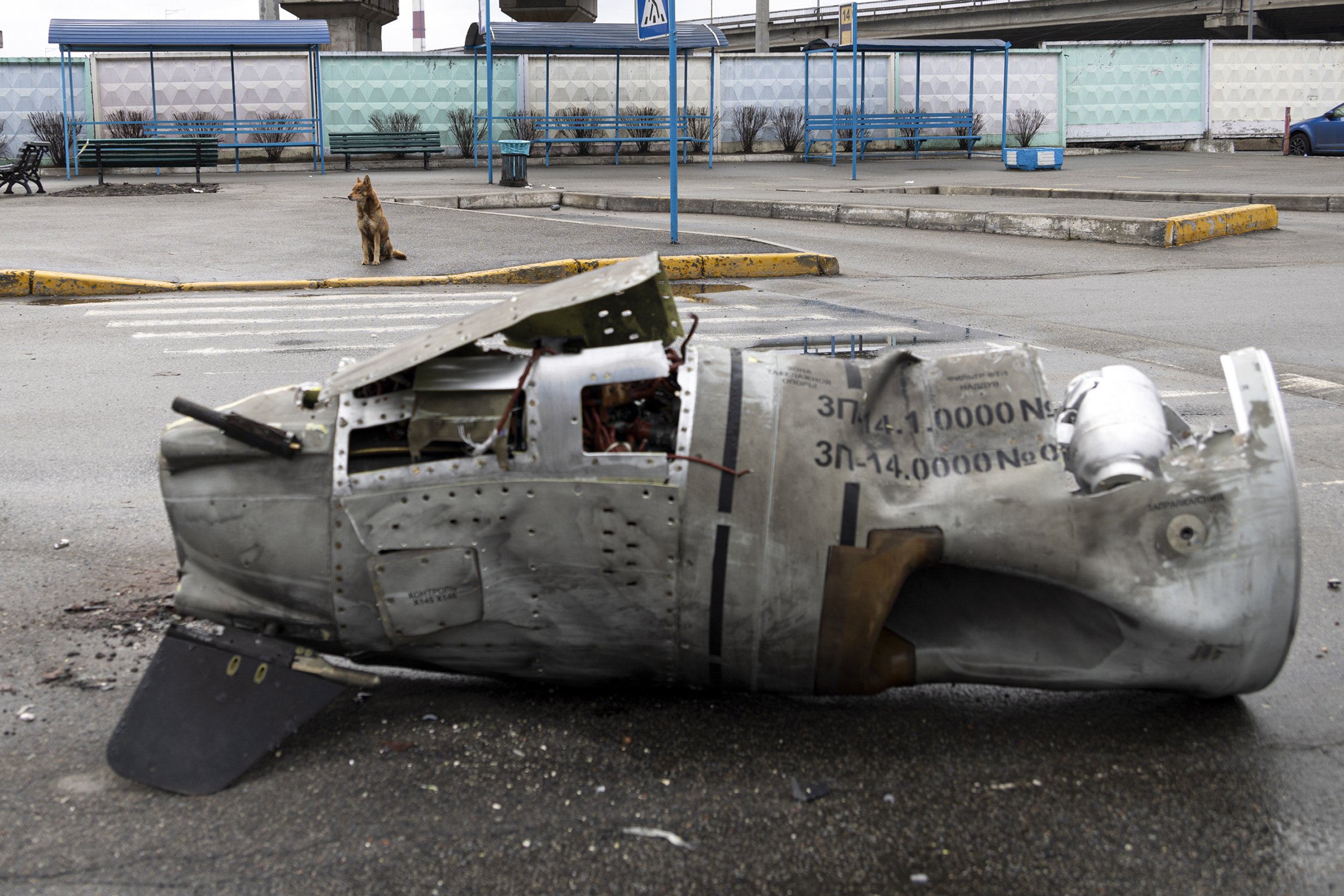 The remains of a missile lie on a street in Vydubychi district of Kyiv, Ukraine, Friday, March 4, 2022. (AP Photo/Andriy Dubchak)