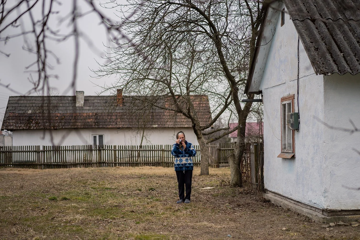  An elderly woman cries during the funeral procession of Ukrainian military servicemen Roman Rak and Mykola Mykytiuk in Starychi, western Ukraine, Wednesday, March 16, 2022. Rak and Mykytiu were killed during Sunday's Russian missile strike on a mili