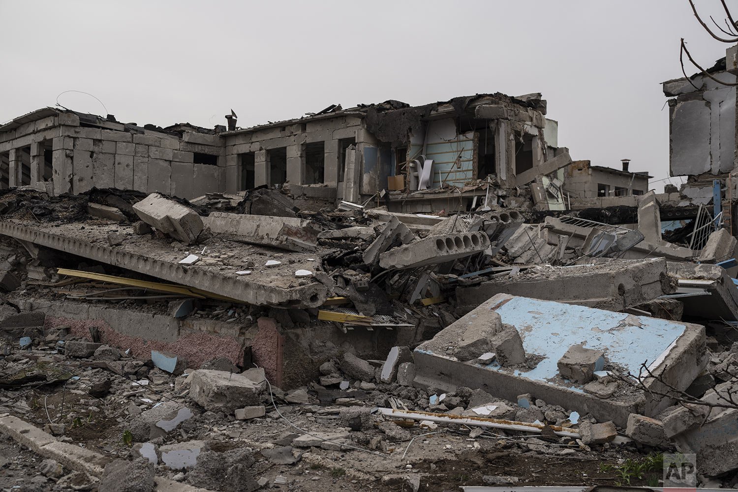  A damaged school lays in ruins following a Russian mid-March attack, on the outskirts of Mykolaiv, Ukraine, Friday, April 1, 2022. (AP Photo/Petros Giannakouris) 