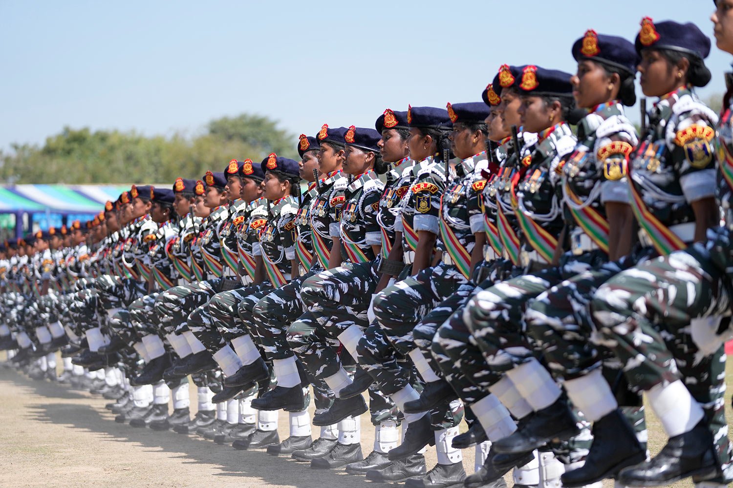  Central Reserve Police Force (CRPF) commandos march during the 83rd raising day ceremony of the CRPF at Maulana Azad Stadium in Jammu, India, Wednesday, March 16, 2022. (AP Photo/Channi Anand) 