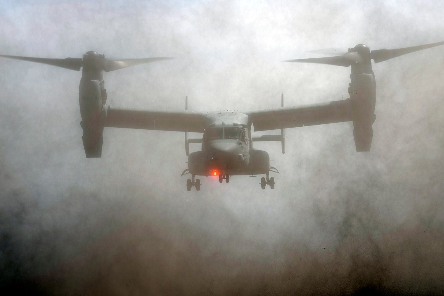  An MV-22 Osprey participates during a joint military helicopter borne operation drill between Japan Ground Self-Defense Force (JGSDF) and U.S. Marines at Higashi Fuji range in Gotemba, southwest of Tokyo, Tuesday, March 15, 2022. (AP Photo/Eugene Ho