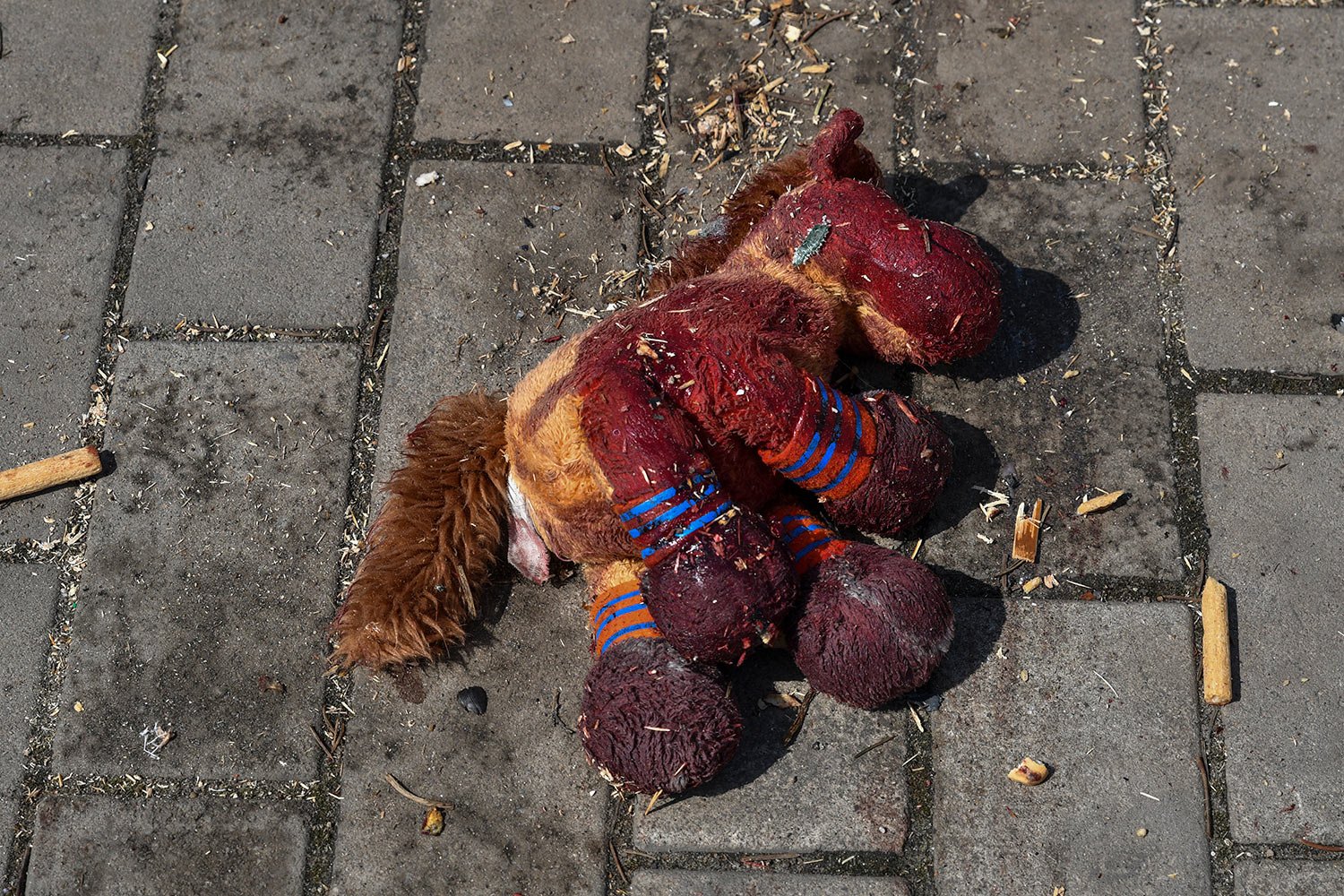  A stuffed horse with bloodstains on it lies on a platform after Russian shelling at the railway station in Kramatorsk, Ukraine, Friday, April 8, 2022. Hours after warning that Ukraine's forces already had found worse scenes of brutality in a settlem