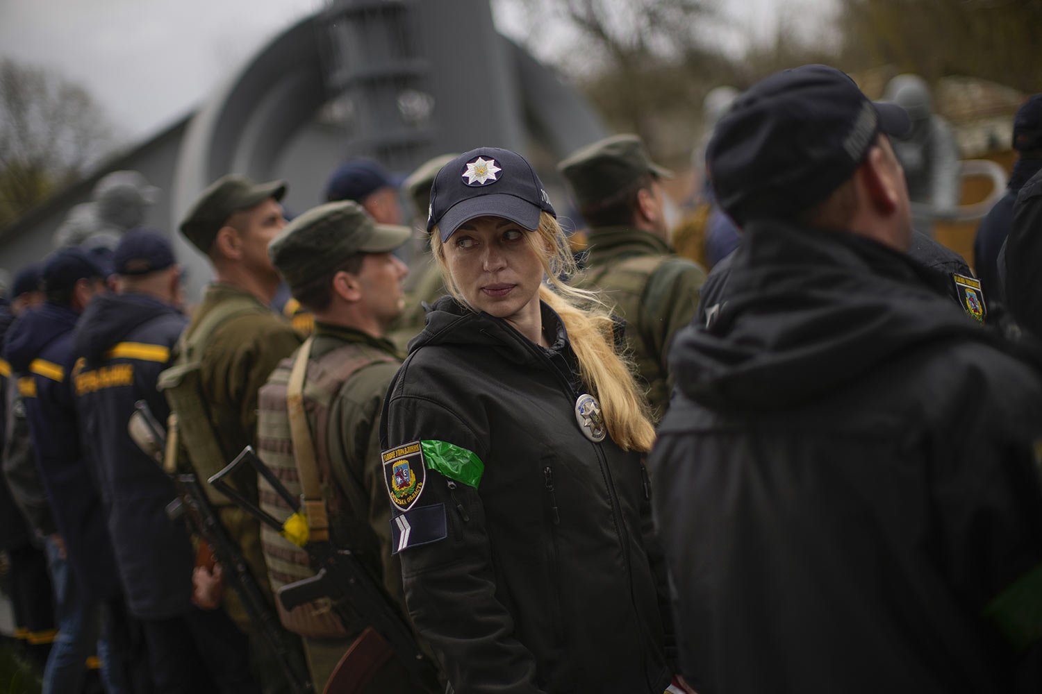  Decorated State Emergency Service unit member Anna Pinchuk attends a ceremony commemorating the Chernobyl nuclear power plant disaster at the Those Who Saved the World monument in Chernobyl, Ukraine, Tuesday, April 26, 2022. (AP Photo/Francisco Seco