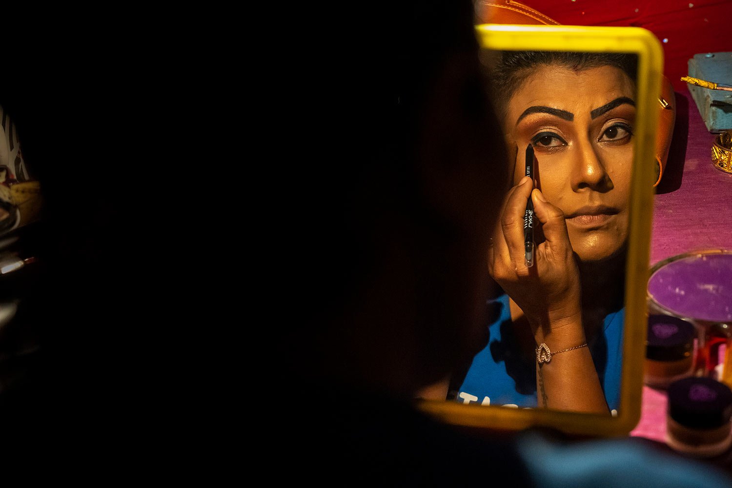  Prastuti Parashar, owner and lead actor of Awahan theater, prepares for a performance at Xetali village, east of Gauhati, India, Wednesday, April 6, 2022. (AP Photo/Anupam Nath) 