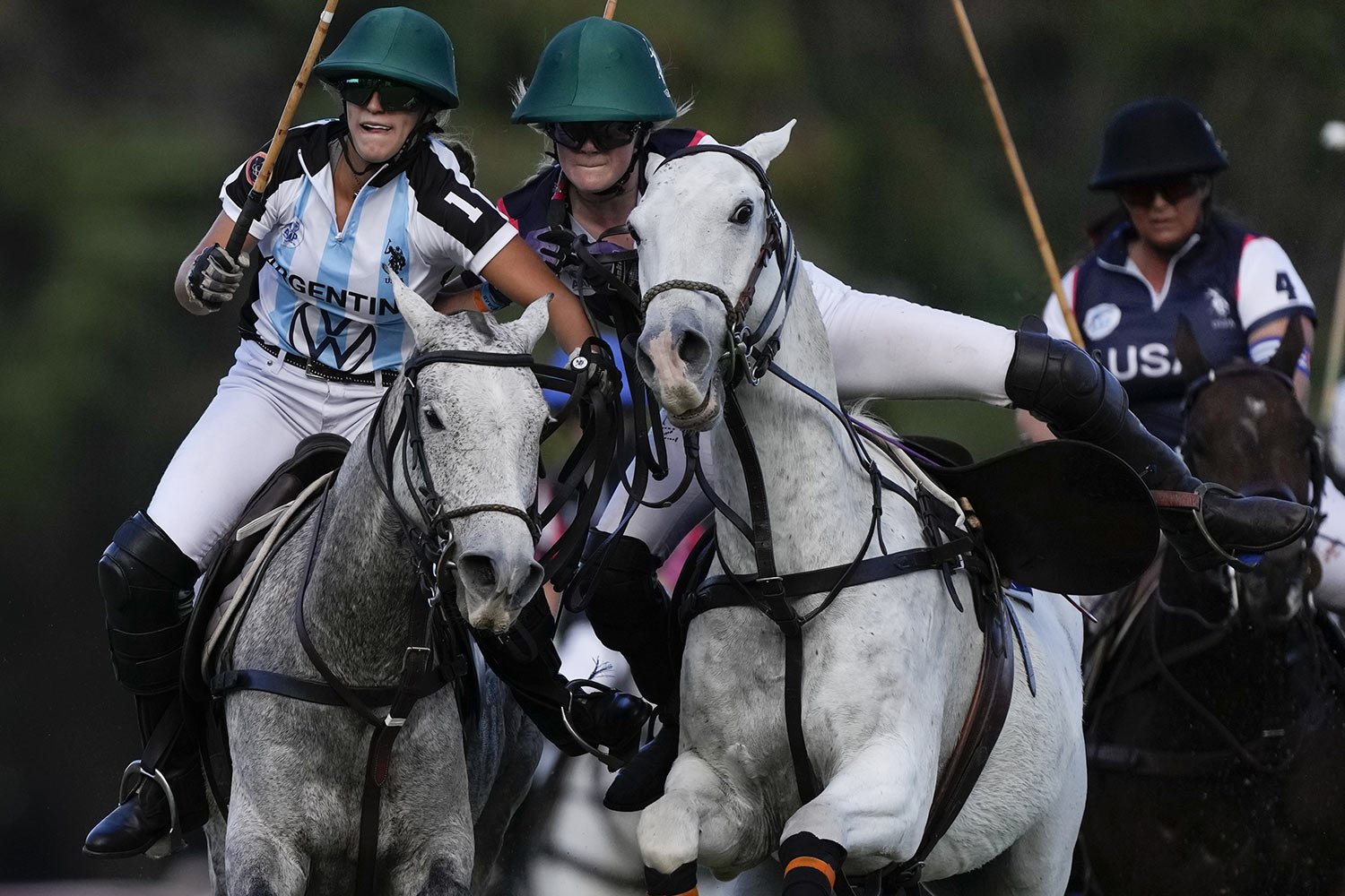  Argentina's Agustina Imaz, left, and Lilian Lequeira from the U.S., compete in the Women's Polo World Championship final match in Buenos Aires, Argentina, April 16, 2022. Argentina won 6-2. (AP Photo/Natacha Pisarenko) 