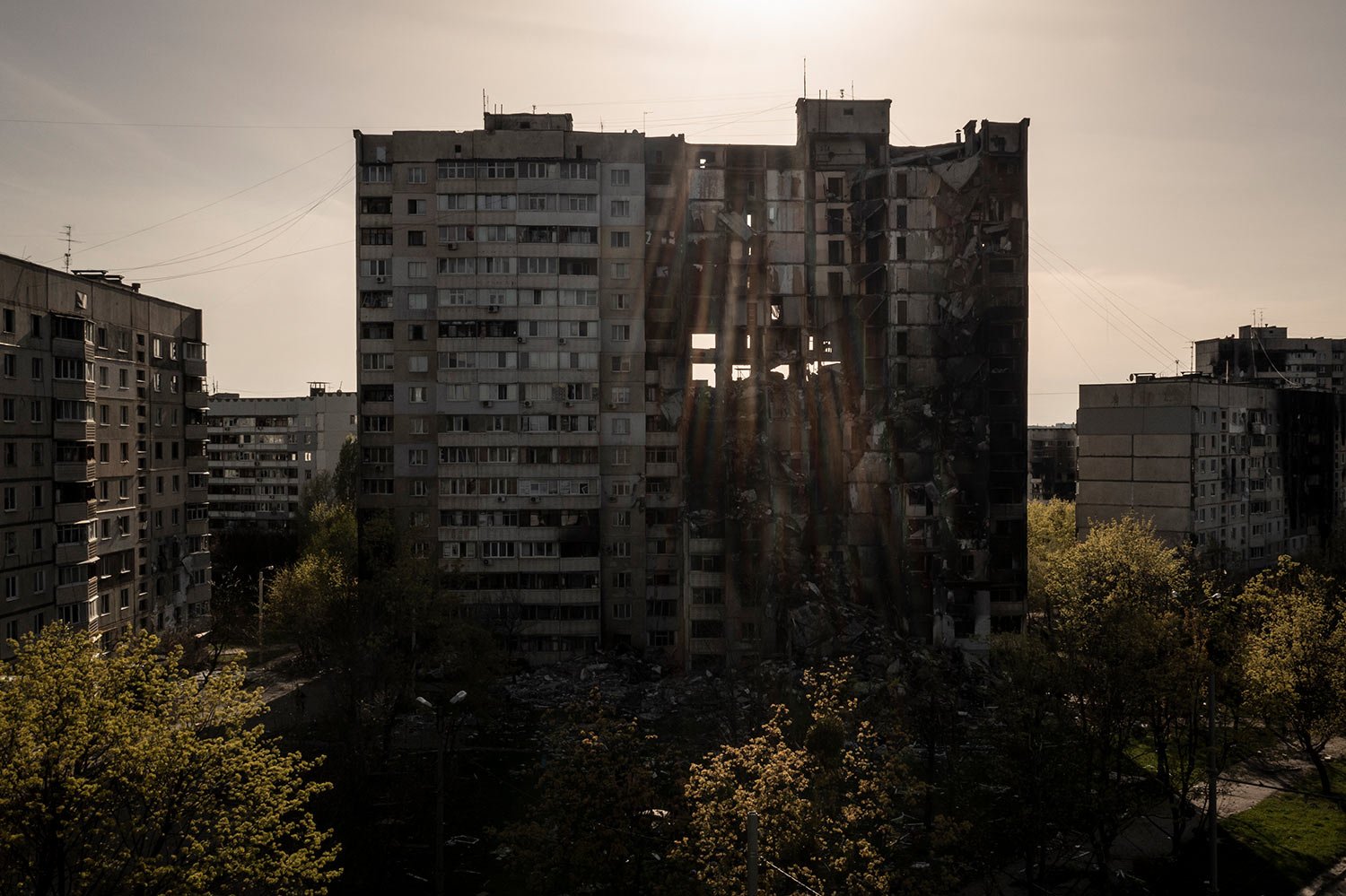  A building heavily damaged by multiple Russian bombardments stands near a frontline in Kharkiv, Ukraine, Monday, April 25, 2022. (AP Photo/Felipe Dana)  