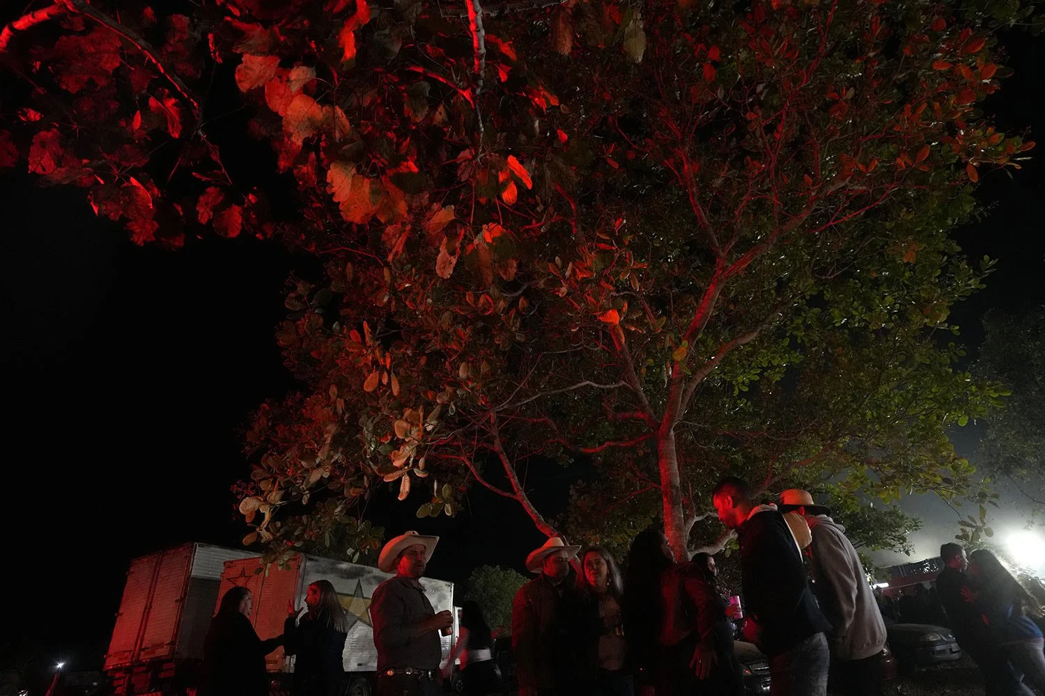  Revelers socialize during the grand dance during the Feast of the Divine, in Pirenopolis, Goias state, Brazil, May 28, 2022. (AP Photo/Eraldo Peres) 