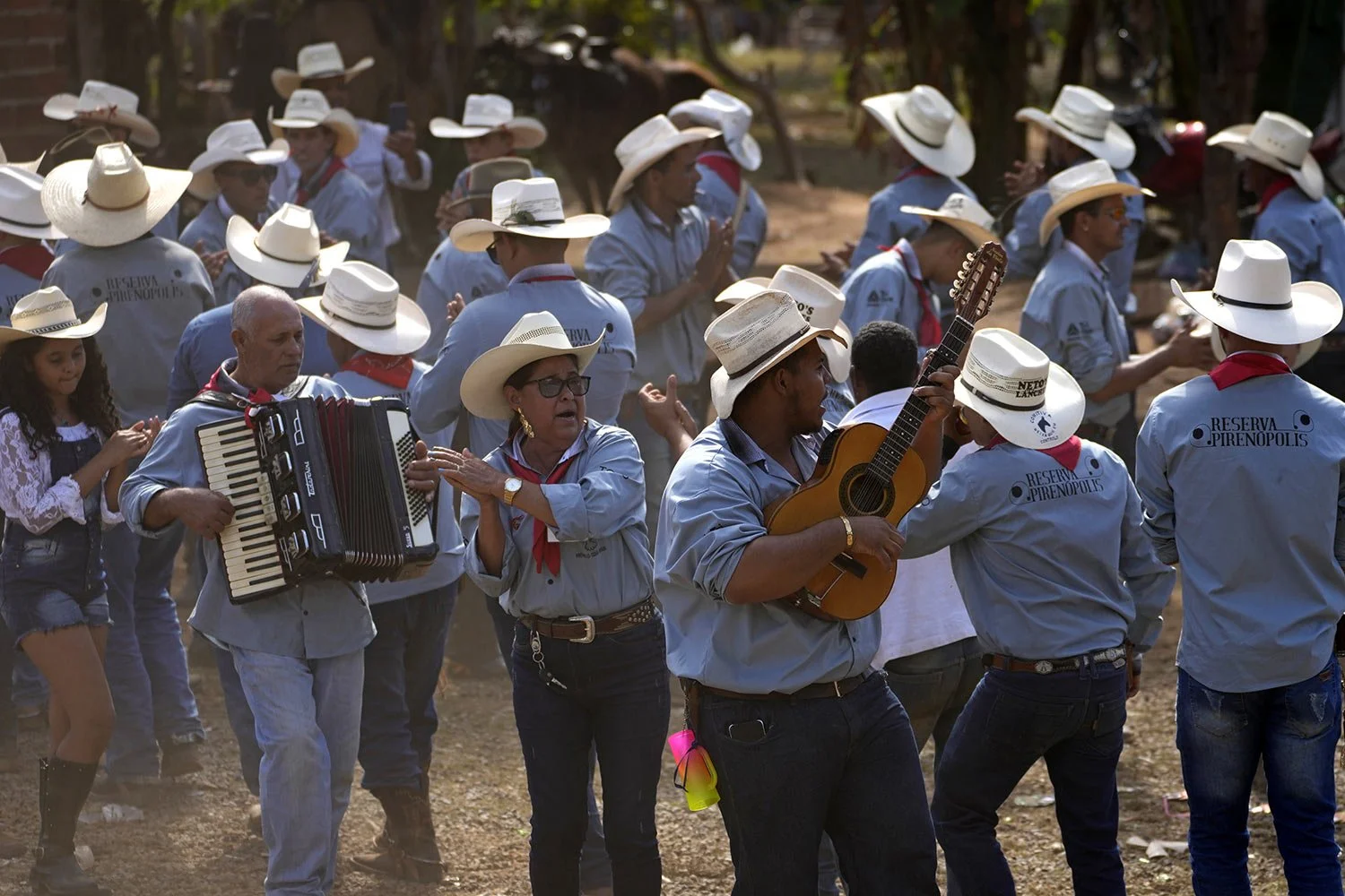 Revelers and musicians dance during the culmination of the Feast of the Divine, in Pirenopolis, Goias state, Brazil, May 28, 2022. (AP Photo/Eraldo Peres) 