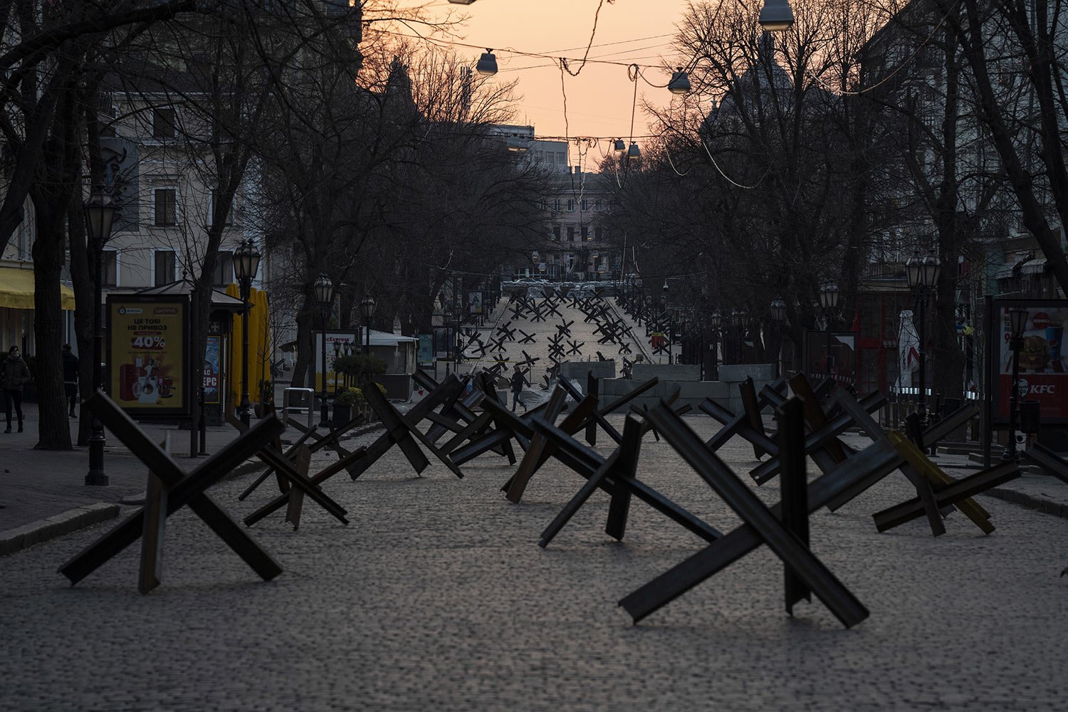  Anti-tank barricades block a street placed in preparation for a possible Russian offensive in Odesa, Ukraine, March 24, 2022. (AP Photo/Petros Giannakouris, File) 