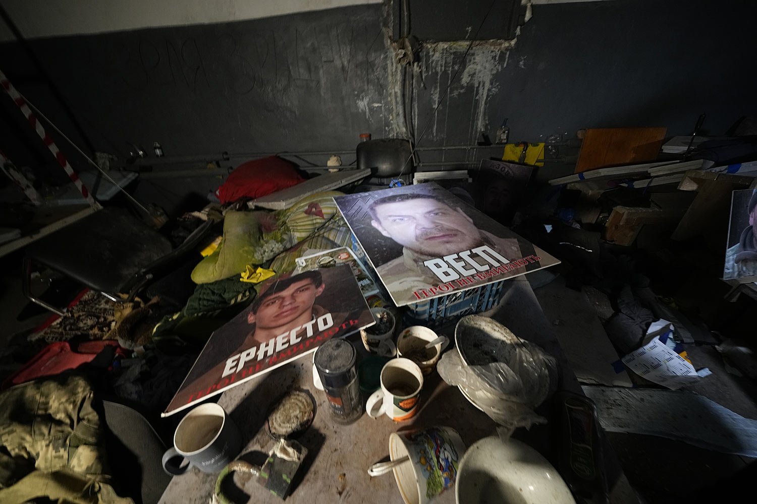  Posters of Ukrainian heroes lay on a table in a labyrinth of the Metallurgical Combine Azovstal where Ukrainian troops were based in Mariupol, in a territory which is under the control of the Government of the Donetsk People's Republic, eastern Ukra