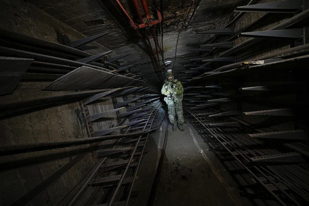  A Russian soldier inspects a labyrinth of the Metallurgical Combine Azovstal, in Mariupol, where Ukrainian troops were based in Mariupol, in a territory which is under the control of the Government of the Donetsk People's Republic, eastern Ukraine, 