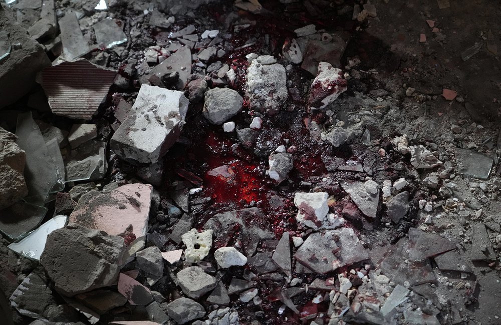  Blood covers debris after a Russian air raid on a building in Lysychansk, Luhansk region, Ukraine, Thursday, June 16, 2022. (AP Photo/Efrem Lukatsky) 