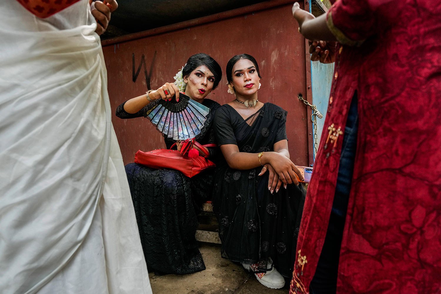  Activists and members of the LGBTQ community wait to take part in a Pride Parade in Kolkata, India, Sunday, June 19, 2022. (AP Photo/Bikas Das) 