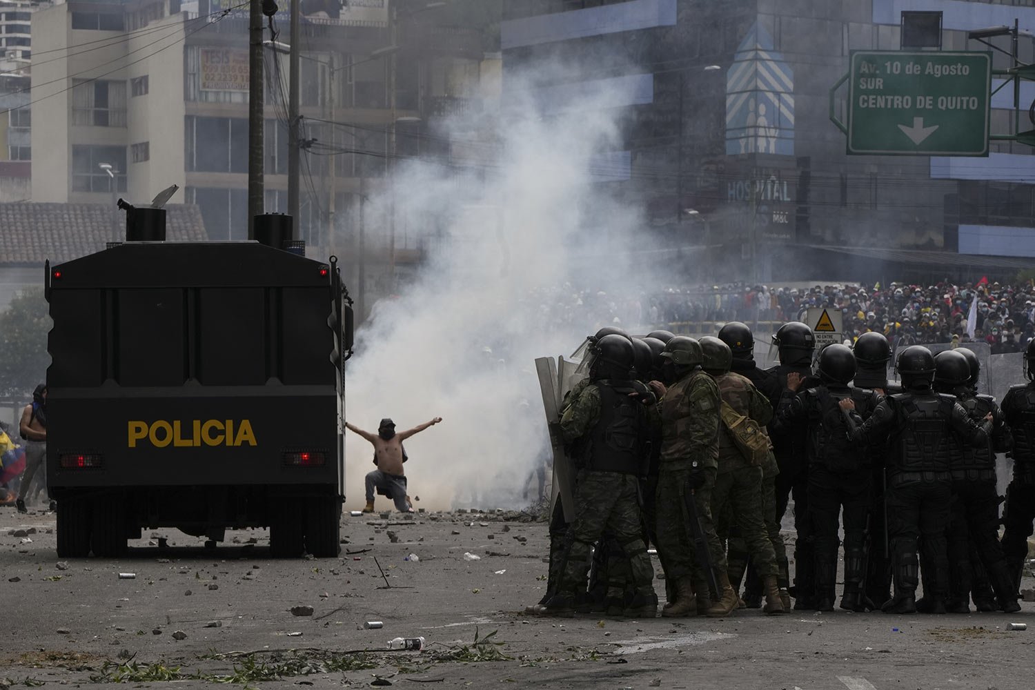  Protesters clash with police during demonstrations against the government of President Guillermo Lasso and rising fuel prices in Quito, Ecuador, Tuesday, June 21, 2022. (AP Photo/Dolores Ochoa) 
