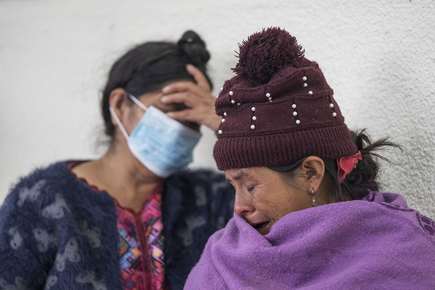  Magdalena Tepaz, mother of Wilmer Tulul, cries as she waits for a meeting to arrange the repatriation of her son's remains, outside the Foreign Ministry in Guatemala City, Thursday, June 30, 2022. Wilmer and his cousin Pascual Melvin Guachiac, both 