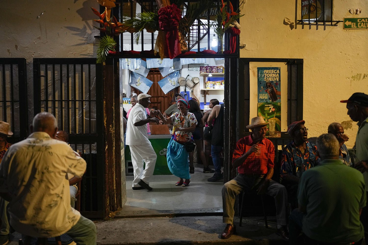  Residents dance during the San Juan Bautista celebrations in Curiepe, Venezuela, Thursday, June 23, 2022. The celebration commemorates the birth of St. John the Baptist and according to local lore the festival is the time when enslaved African Ameri