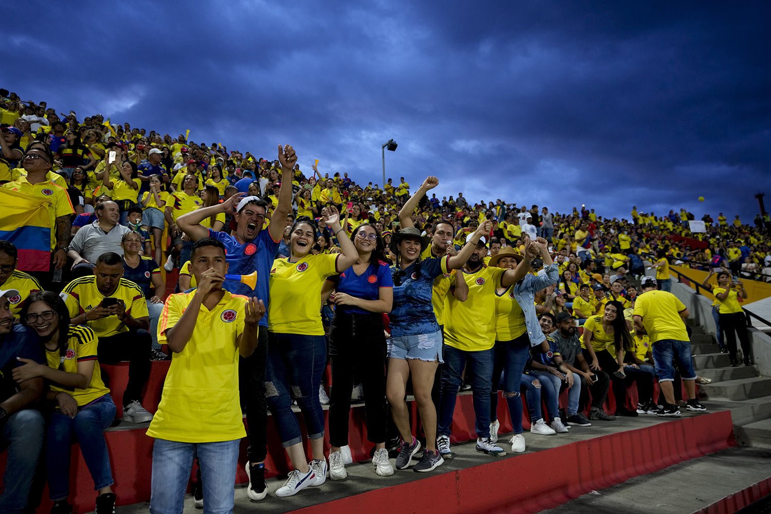  Soccer fans wait for the start of the Women's Copa America final soccer match between Brazil and Colombia in Bucaramanga, Colombia , Saturday, July 30, 2022. (AP Photo/Fernando Vergara) 