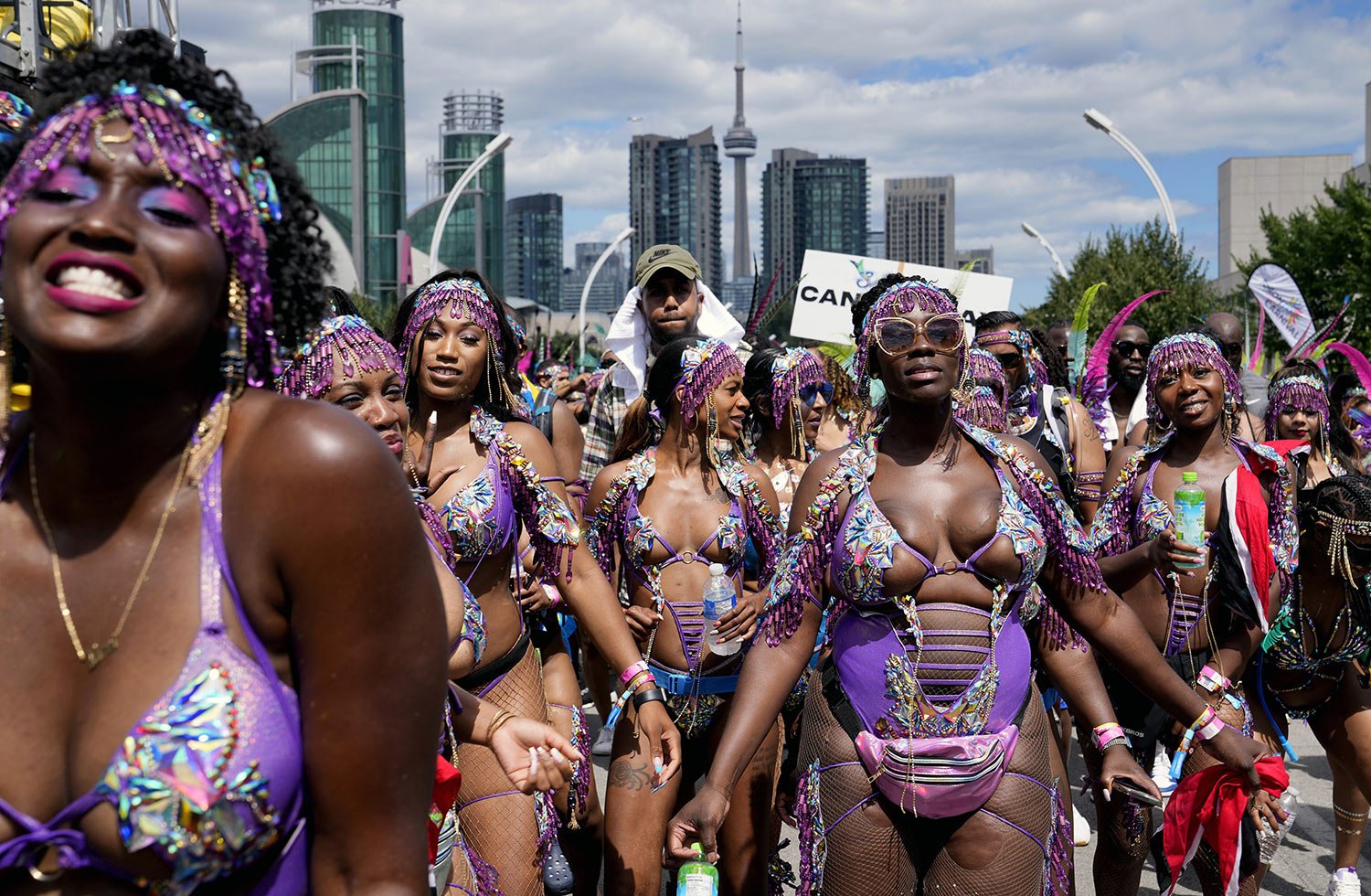  Masqueraders perform during the Caribbean Carnival parade in Toronto, Canada, Saturday, July 30, 2022. (AP Photo/Kamran Jebreili) 