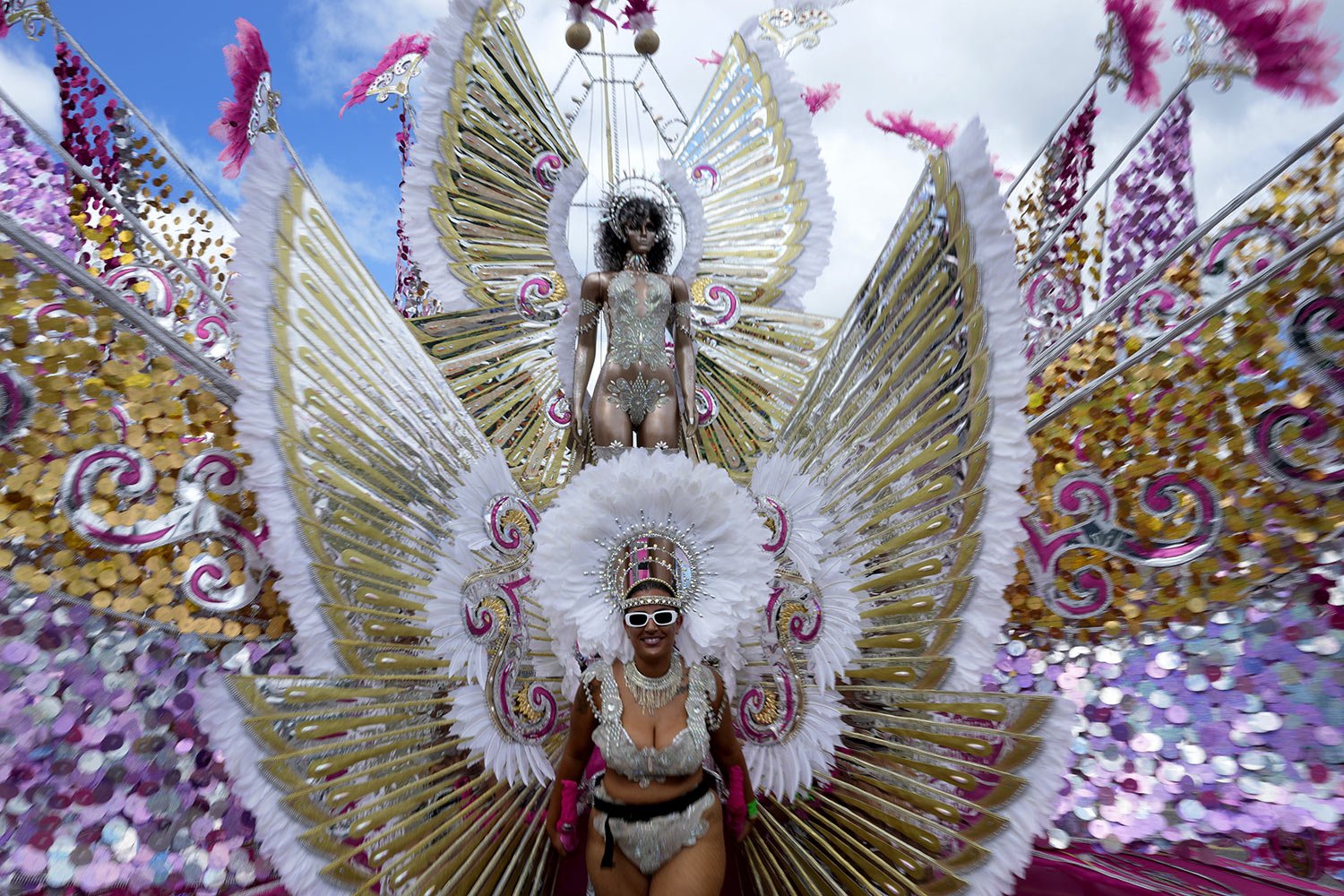  A masquerader performs during the Caribbean Carnival parade in Toronto, Canada, Saturday, July 30, 2022. (AP Photo/Kamran Jebreili) 