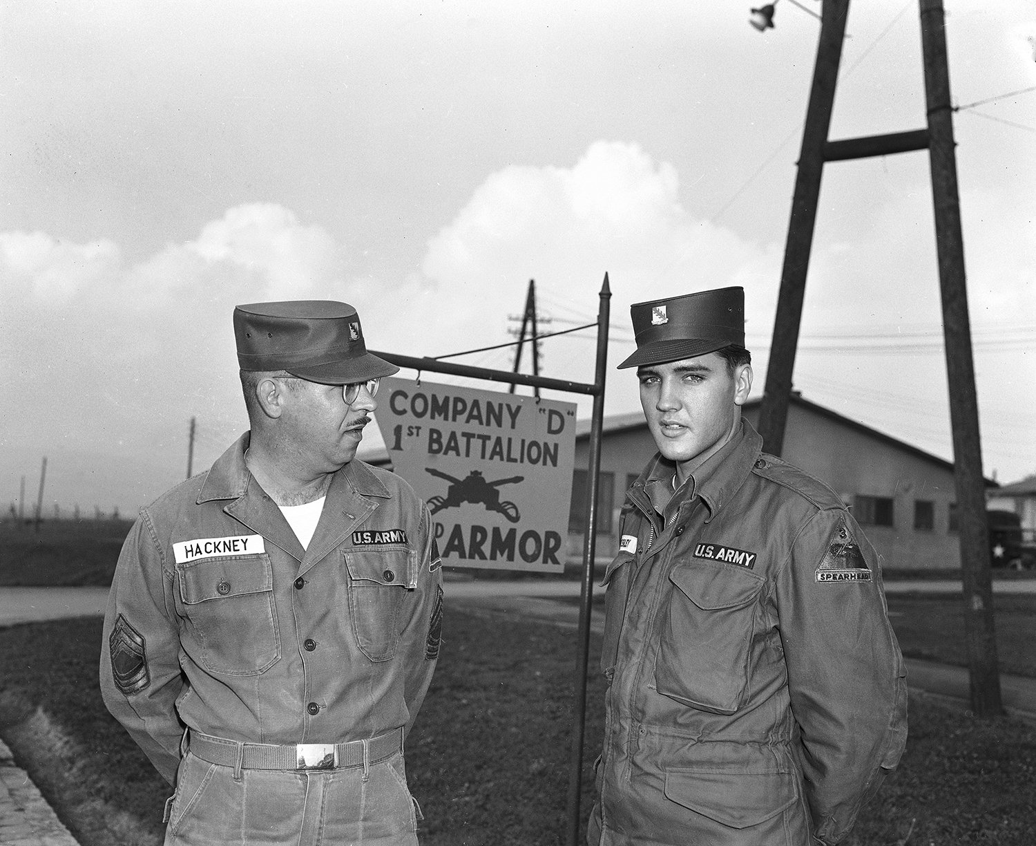  Elvis Presley, the American rock 'n' roll singer-turned soldier, poses with his first sergeant, Master Sgt. Edward Hackney of Philadelphia, in the Friedberg, West Germany barracks, Oct. 3, 1958. Presley has been assigned to the Third Armored (Spearh