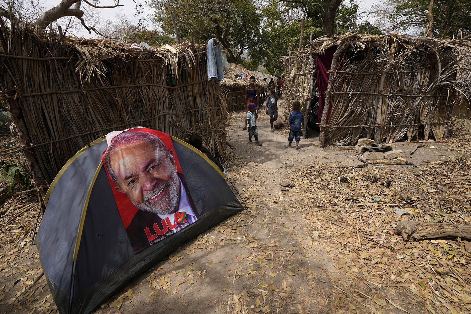  A towel emblazoned with an image of Brazil's former President Luiz Inacio Lula da Silva, who is running for reelection, is draped over a tent during the culmination of the week-long pilgrimage and celebration for the patron saint "Nossa Senhora da A
