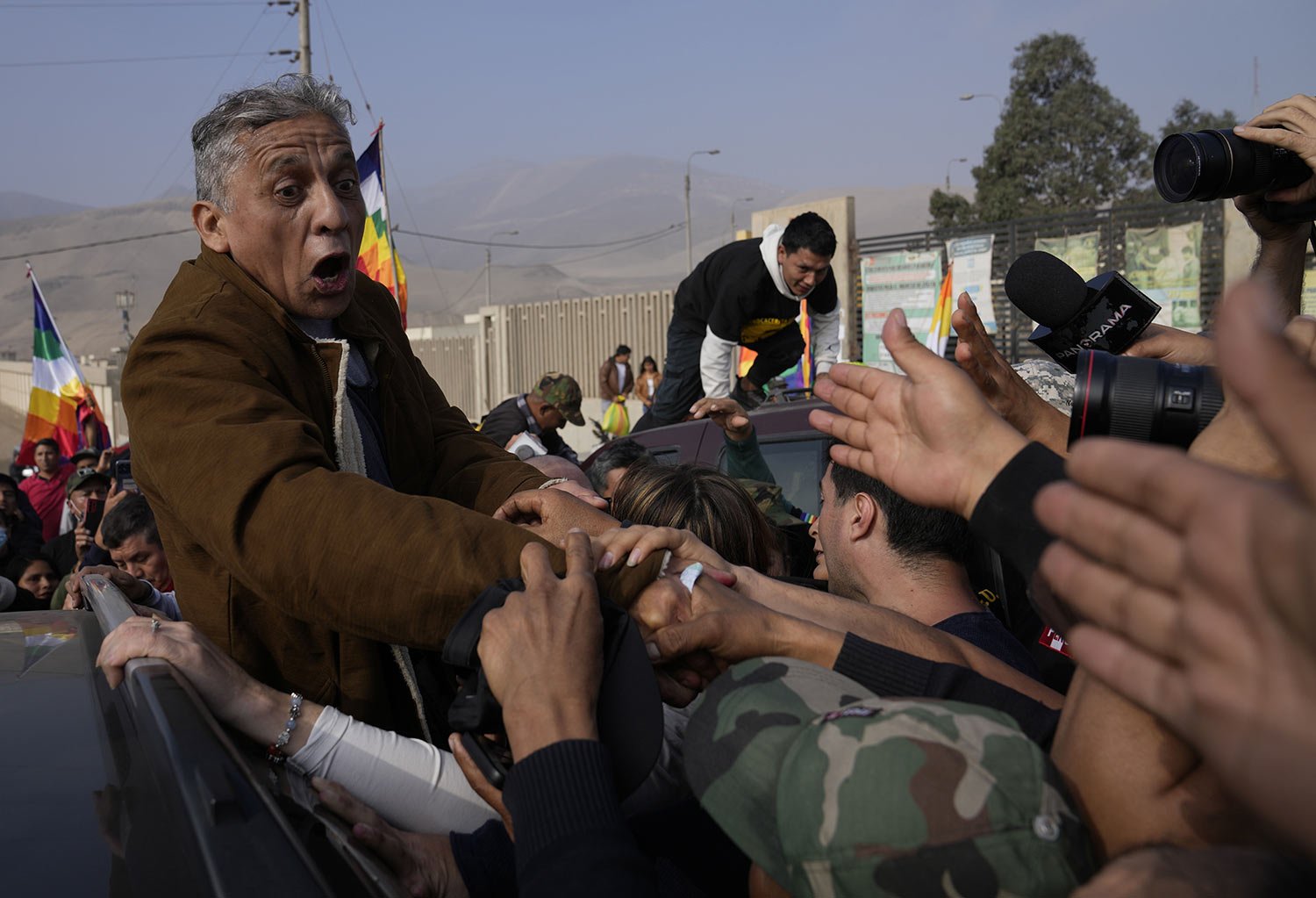  Former Army Maj. Antauro Humala, the brother of former President Ollanta Humala, greets supporters after he was released from prison, on the outskirts of Lima, Peru, Saturday, Aug. 20, 2022. Humala was serving a 19-year sentence for rebellion after 