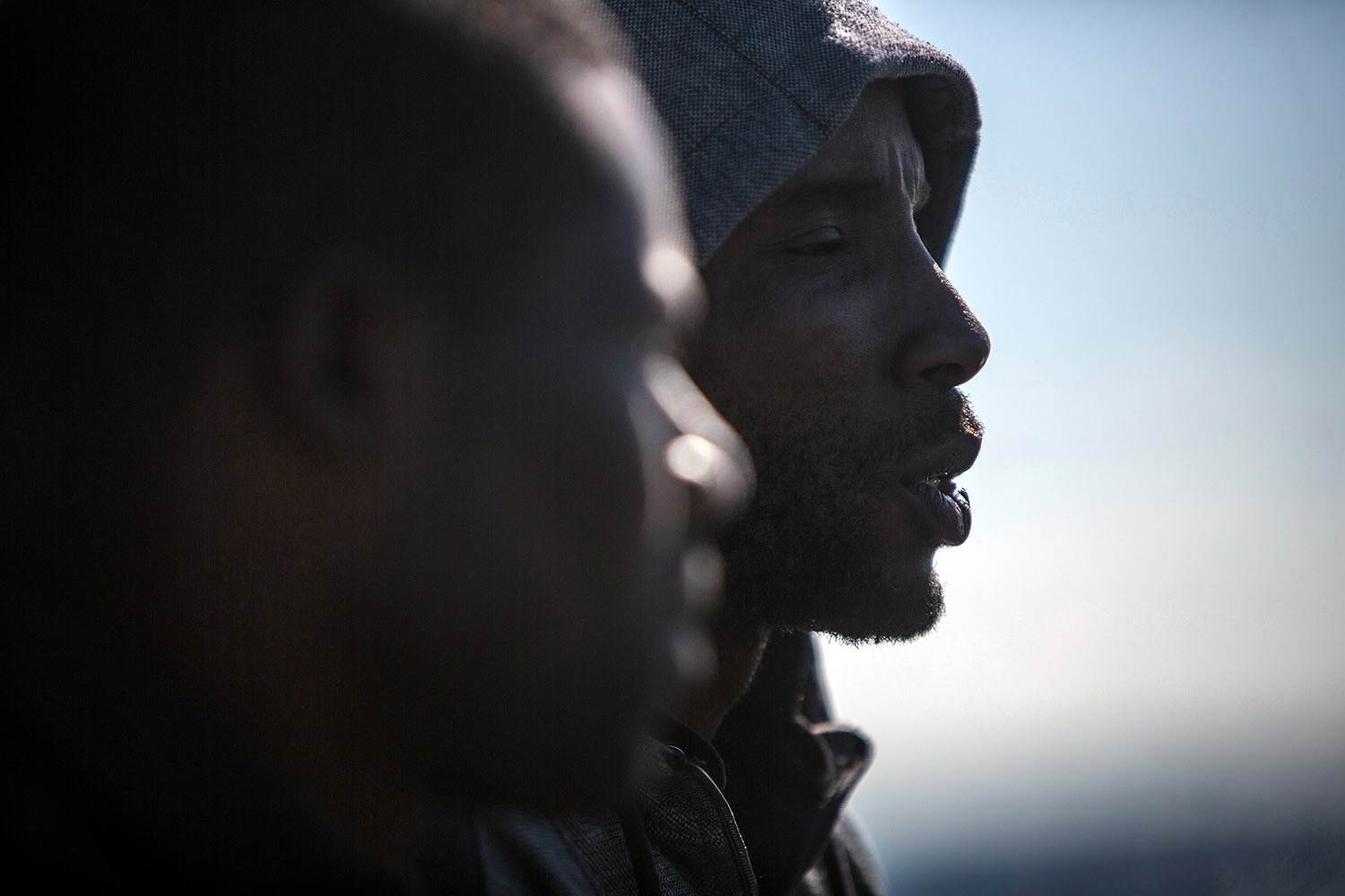  Migrants looks out from the Nuestra Madre de Loreto Spanish fishing vessel carrying 12 migrants rescued off the coast of Lybia on Friday, Nov. 30, 2018. (AP Photo/Javier Fergo) 