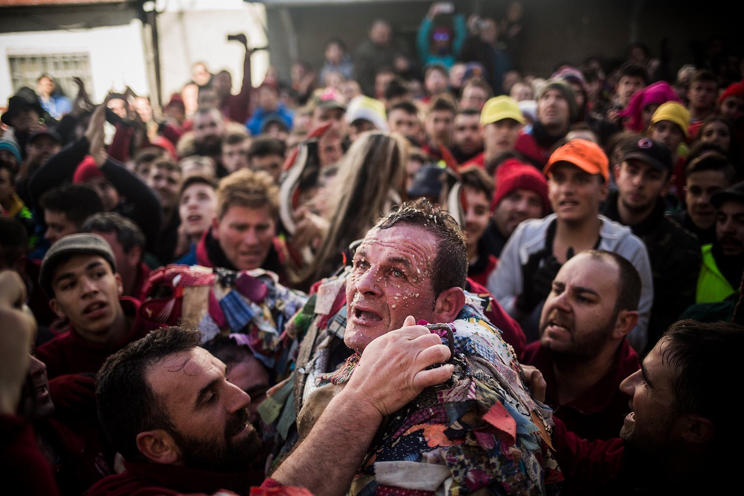  Miguel Angel Moreno is lifted by people after playing the Jarramplas in the Spanish town of Piornal, Spain, Sunday, Jan. 20, 2019. (AP Photo/Javier Fergo) 