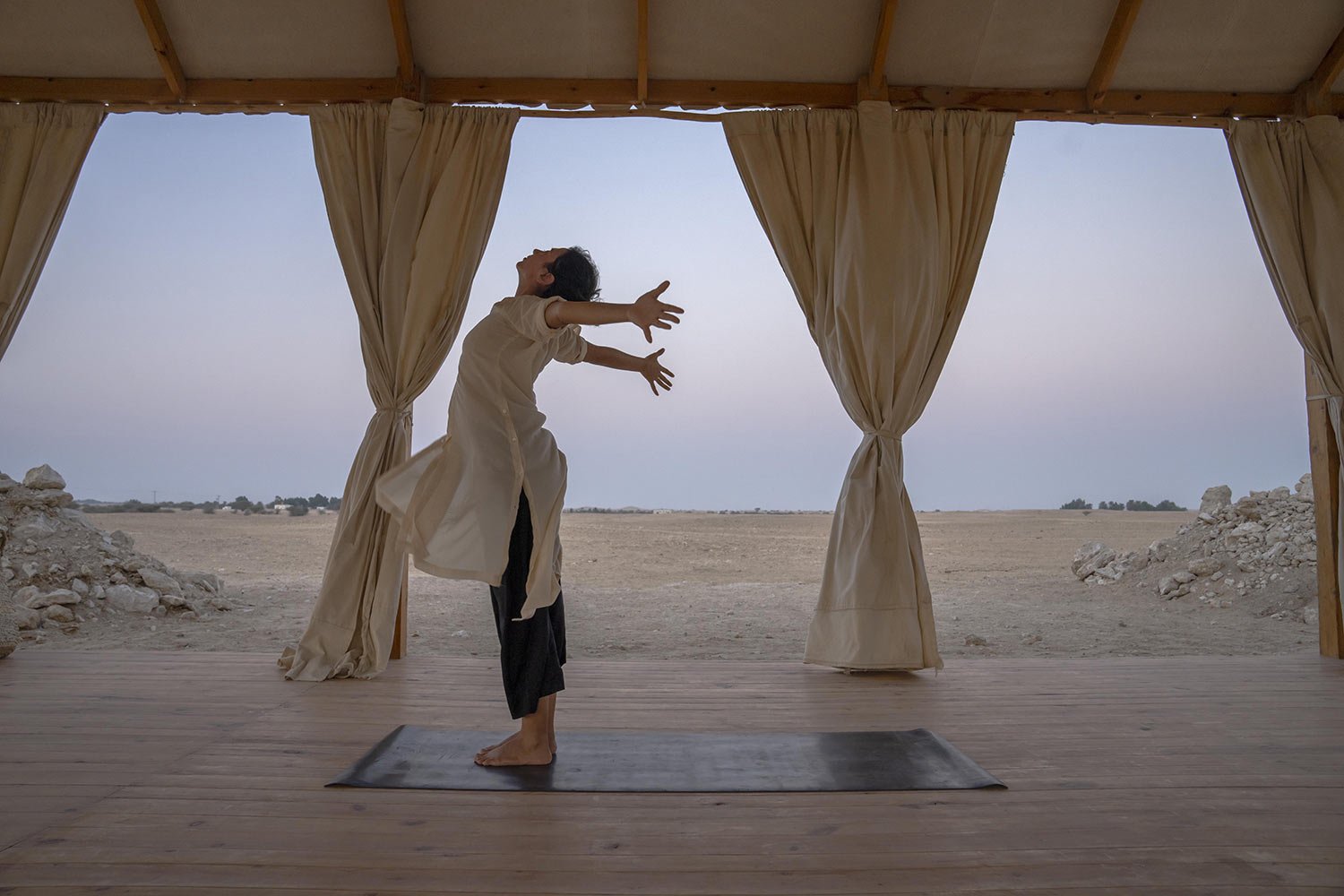  Indian yoga teacher Diksha practices where she gives classes at Heenat Salma farm in Al Shahaniah, Qatar, Wednesday, Oct. 19, 2022. (AP Photo/Nariman El-Mofty) 