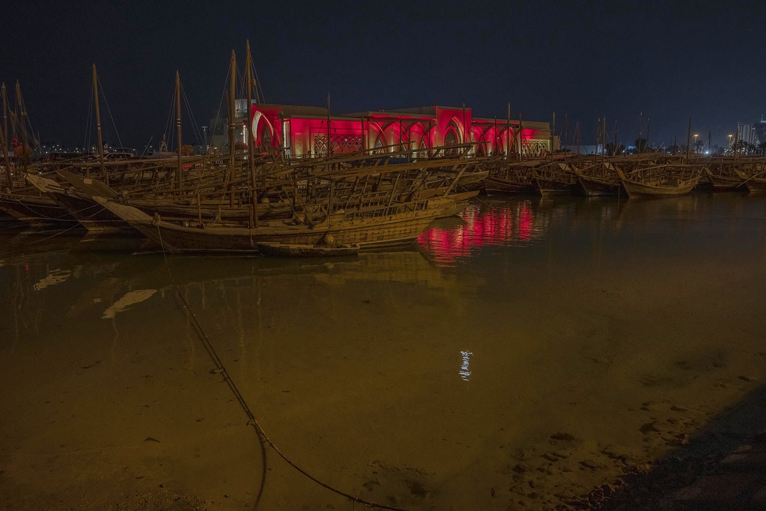  Traditional wooden boats are docked on the corniche in Doha, Qatar, Friday, Oct. 14, 2022. (AP Photo/Nariman El-Mofty) 