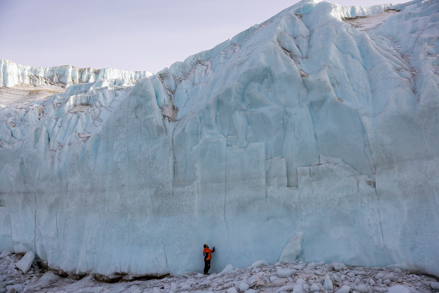  Shayne Misselbrook stands in front of a glacier in the Taylor Valley in Antarctica, Thursday, Oct. 27, 2022. (Mike Scott/NZ Herald via AP, Pool) 