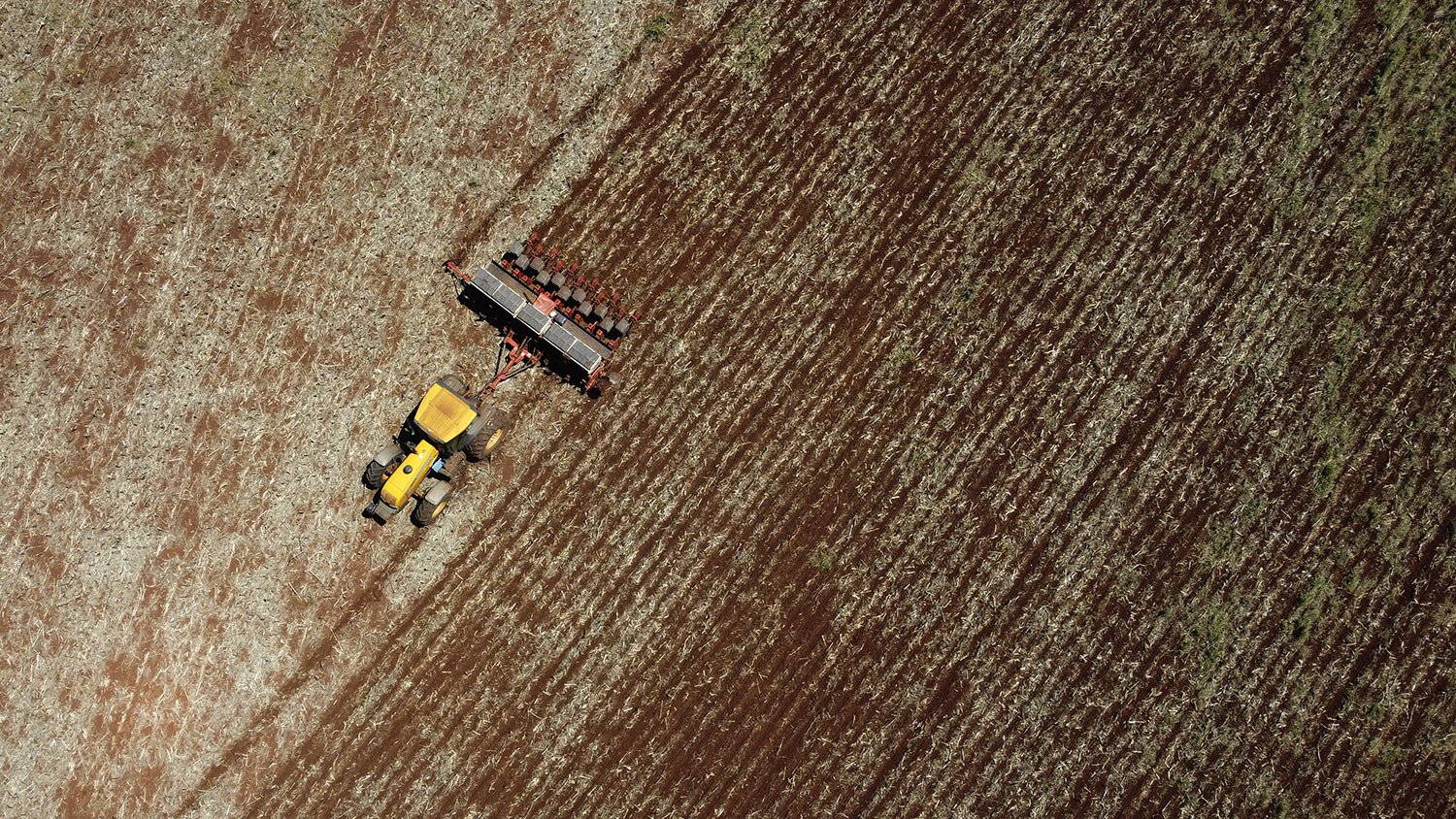  An agricultural machine plant soybeans on a farm in a rural area of Sidrolandia, Mato Grosso do Sul state, Brazil, Saturday, Oct. 22, 2022. (AP Photo/Eraldo Peres) 