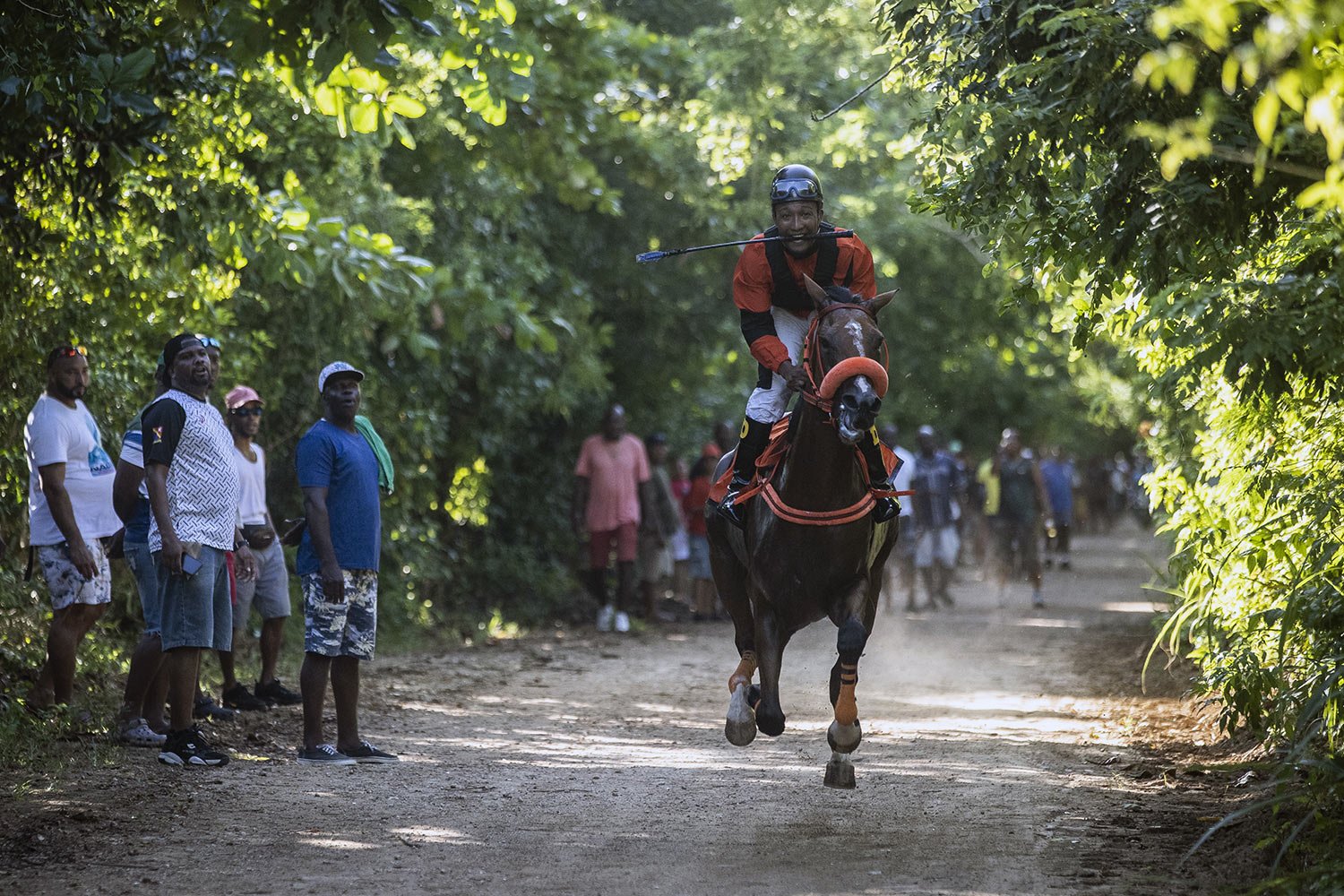  Racehorse Chelsea finishes last, after rival Dubai, in a two-horse race on San Andres Island in Colombia, Saturday, Nov. 12, 2022. There’s no racetrack on the tiny Caribbean island of San Andres, but passion for horse racing runs deep. (AP Photo/Iva