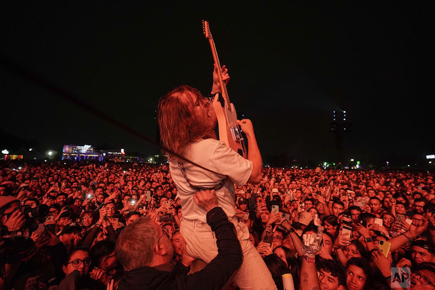  Lee Kiernan of the British rock band Idles, performs during the Corona Capital music festival in Mexico City, Sunday, Nov. 20, 2022. (AP Photo/Eduardo Verdugo) 