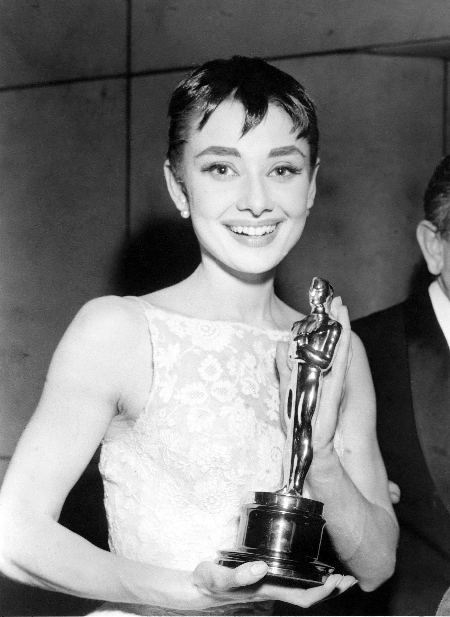  Actress Audrey Hepburn poses with her Oscar statuette at the annual Academy Awards presentations in New York, on March 24, 1954. Hepburn was awarded best actress for her first movie starring role, the portrayal of a free-spirited Princess in the mot