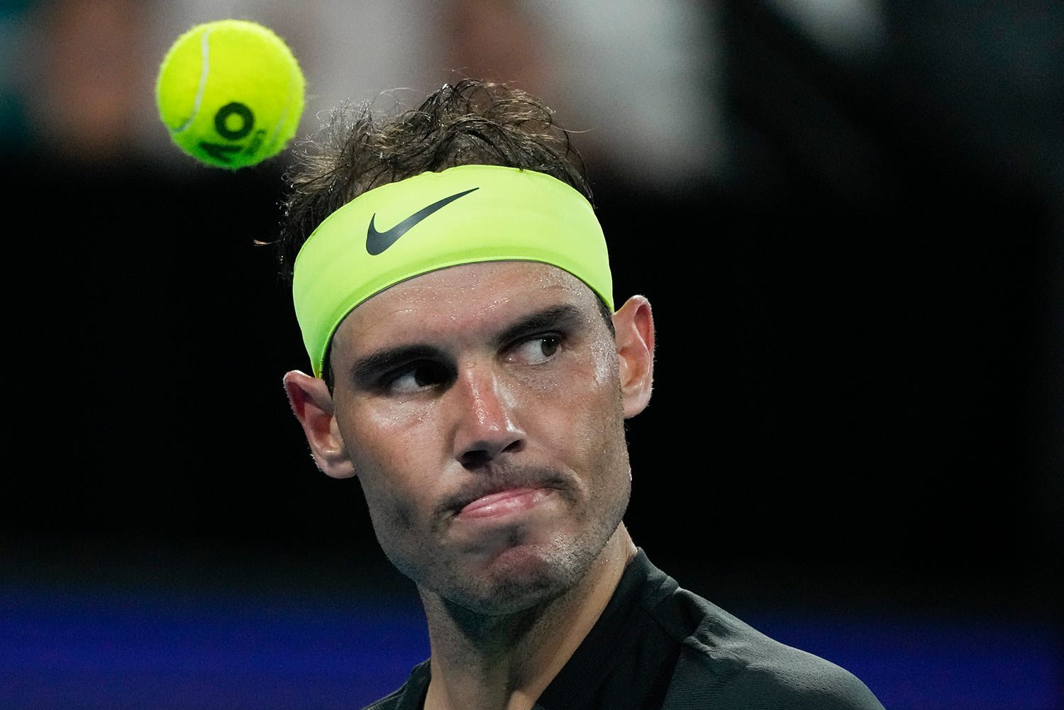 Spain's Rafael Nadal reacts after losing a game to Australia's Alex de Minaur during their Group D match at the United Cup tennis event in Sydney, Australia, Monday, Jan. 2, 2023. (AP Photo/Mark Baker) 