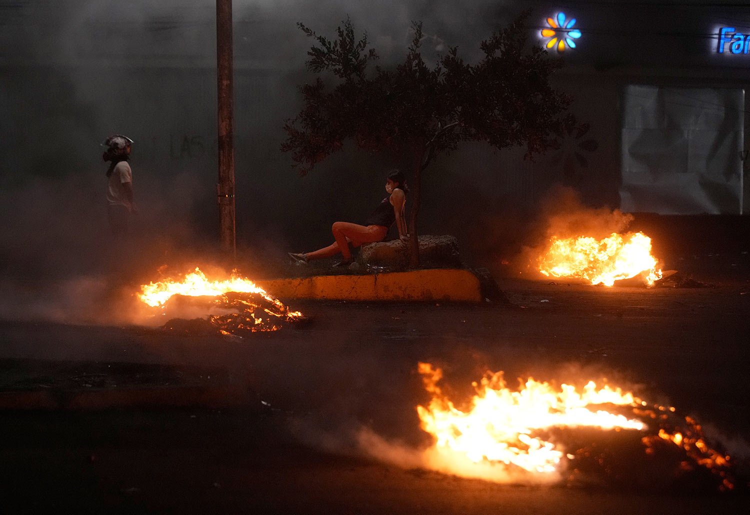  A flaming roadblock burns after it was set up by supporters of arrested opposition leader and governor of Santa Cruz Luis Fernando Camacho in Santa Cruz, Bolivia, Jan. 3, 2023. Prosecutors in Bolivia on Dec. 29, 2022, remanded Camacho into custody f