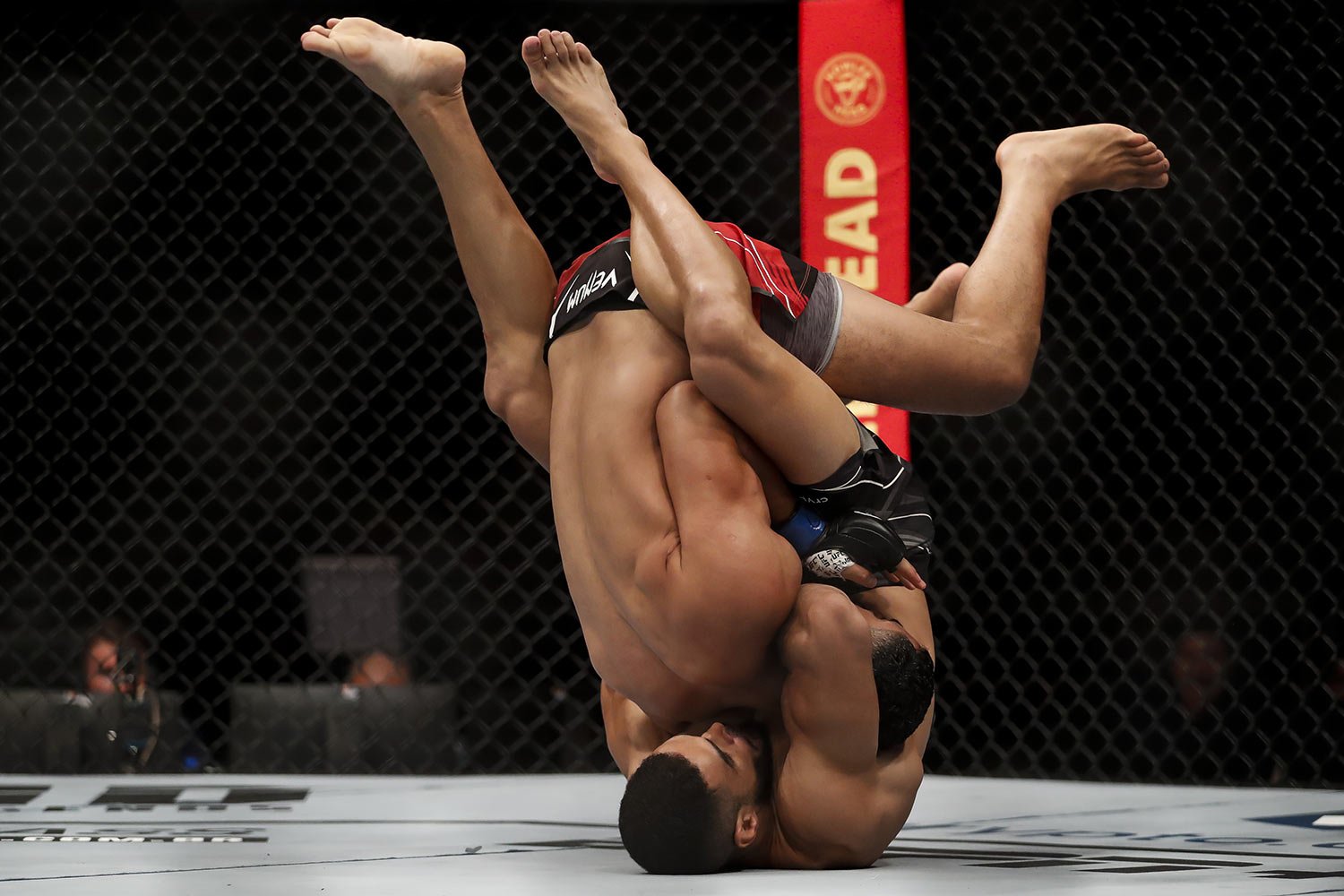  Brazil's Gabriel Bonfim, right, takes down Tunisia's Mounir Lazzez during their welterweight bout at the UFC 283 mixed martial arts event in Rio de Janeiro, Brazil, Jan. 21, 2023. (AP Photo/Bruna Prado) 
