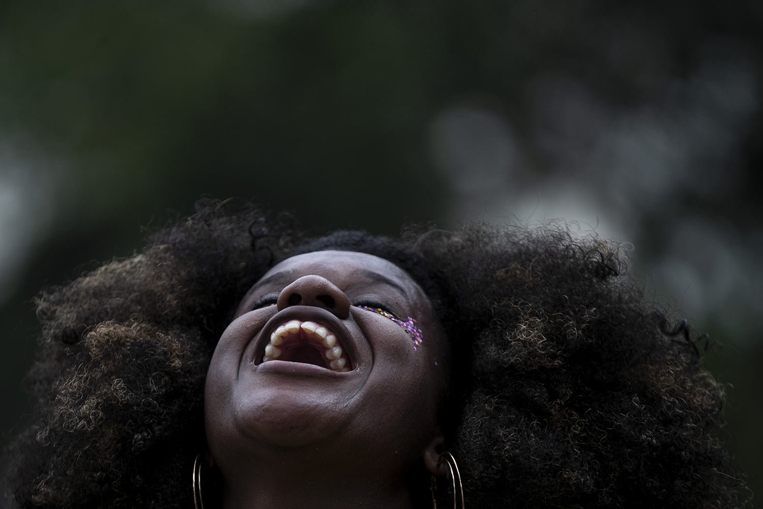  A person attends the street carnival parade put on by the "Bloconce" block, a female group referencing U.S. singer Beyonce, at the unofficial start of Carnival in Rio de Janeiro, Brazil, Jan. 8, 2023. (AP Photo/Bruna Prado) 