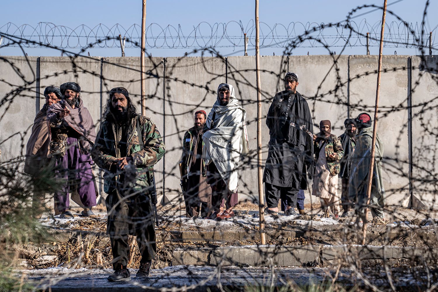  Taliban fighters check the site of an explosion, near the Interior Ministry, in Kabul, Afghanistan, Sunday, Jan. 1, 2023.  (AP Photo/Ebrahim Noroozi) 