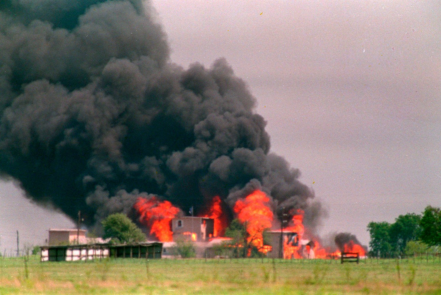  Flames engulf the Branch Davidian compound April 19, 1993 in Waco, Texas.  Eighty-one Davidians, including leader David Koresh, perished as federal agents tried to drive them out of the compound. (AP Photo/Susan Weems) 