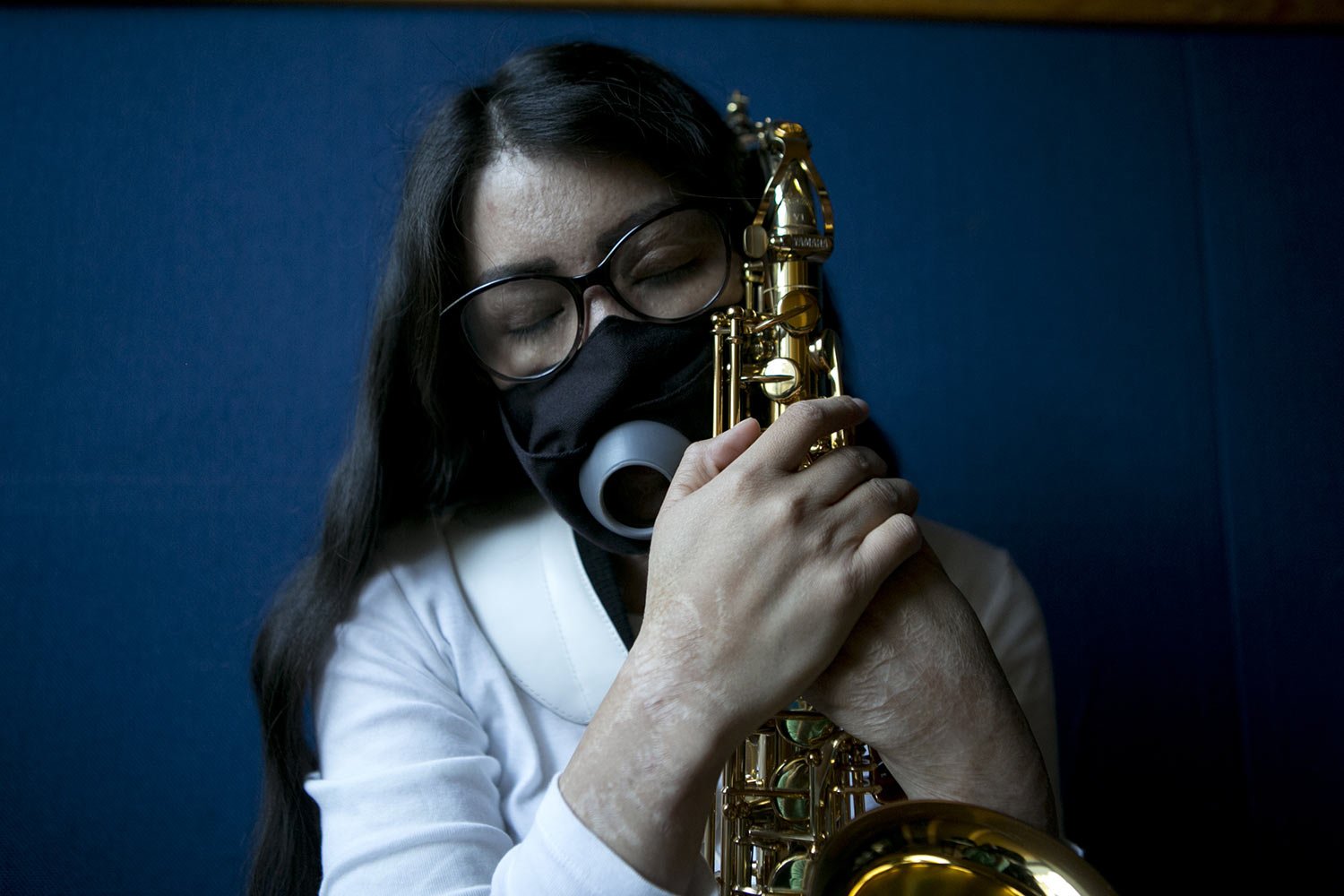  Maria Elena Ríos holds her saxophone at the end of a rehearsal at the National Autonomous University of Mexico music department, in Mexico City, Tuesday, Feb. 14, 2023. Ríos, 29, thought her career as a musician and her devotion to her sax was what 