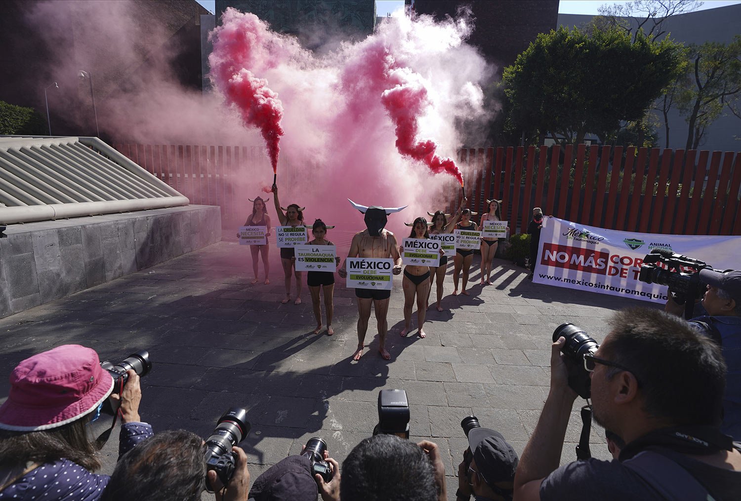  Demonstrators wearing horns and smeared with fake blood, representing bulls stabbed in bullfights, protest outside Congress to ask legislators to approve the initiative to ban bullfighting that is currently before the Environmental Commission in Mex