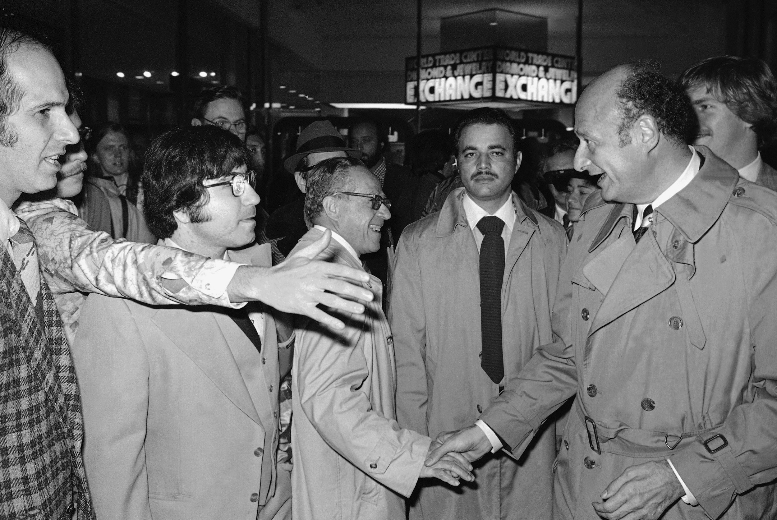  Ed Koch, democratic candidate for Mayor of New York City, right, shakes hands with his constituents at the World Trade Center in Manhattan, Monday Nov. 7, 1977. Candidates are doing some last minute campaigning before Tuesday?s election. (AP Photo/C