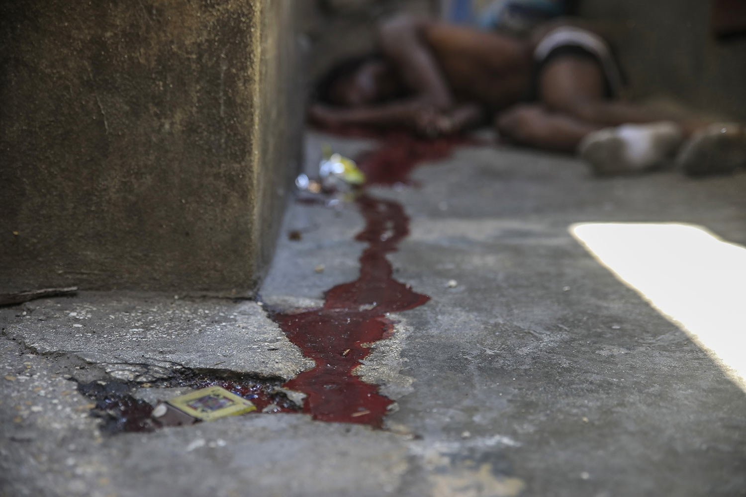 The body of Haitian comedian Sexy lies on the ground after he was shot dead in Port-au-Prince, Haiti, March 3, 2023, amid a sharp rise in gang violence that has left dozens dead in recent weeks. (AP Photo/Odelyn Joseph) 
