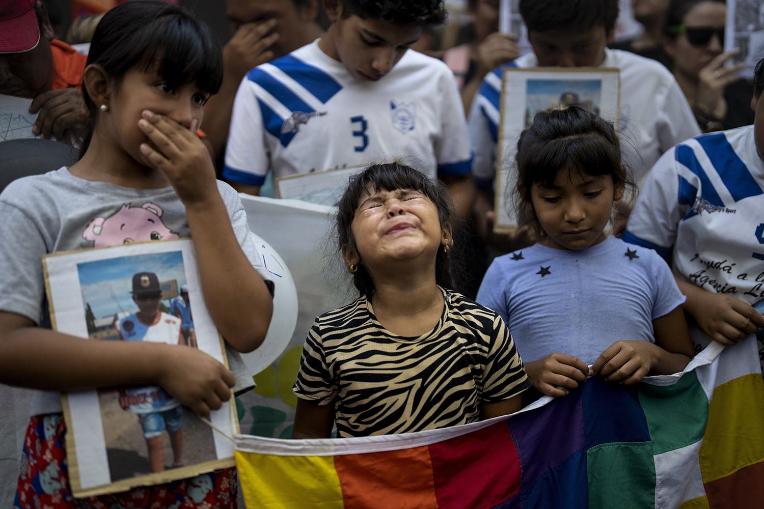  Emma Jerez cries as she attends a march demanding justice after the murder of Maximo Jerez, her 11-year-old cousin killed the previous weekend when a gunman attacked a birthday party, in Rosario, Argentina, March 10, 2023. (AP Photo/Rodrigo Abd) 