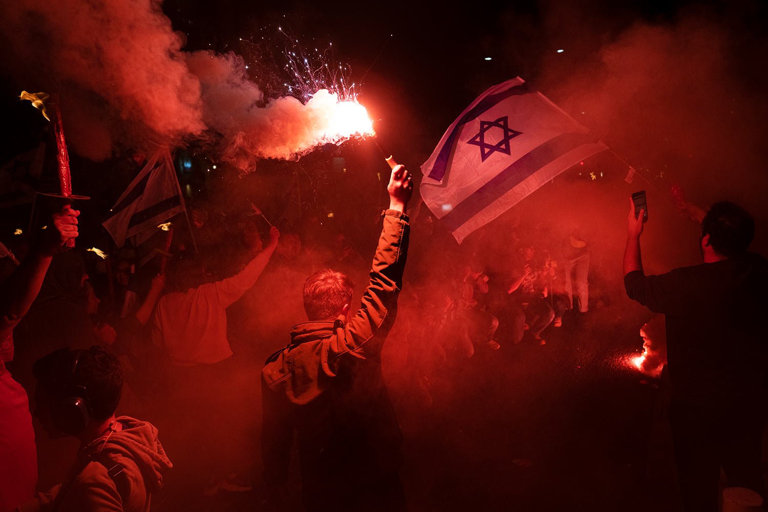  Israelis protest against plans by Prime Minister Benjamin Netanyahu's government to overhaul the judicial system, in Tel Aviv, Israel, Thursday, March 9, 2023. (AP Photo/Oded Balilty) 