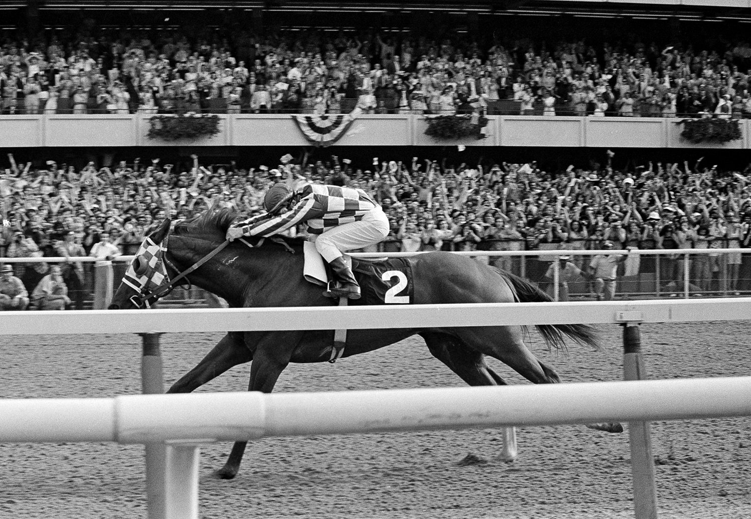  Ron Turcotte hangs on as Secretariat romps along the final stretch just before the finish line and a victory in the 105th running of the Belmont Stakes at Belmont Park in Elmont, N.Y., June 9, 1973. Secretariat became the ninth horse to win racing's