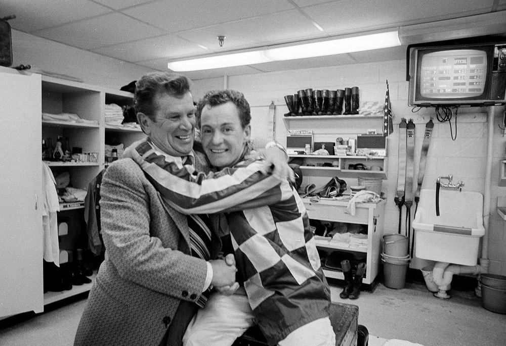  Warren C. Mehrtens, left, a winner of Racing's Triple Crown with Assault in 1946, hugs jockey Ron Turcotte in the Belmont Park jockey room after Turcotte and Secretariat won the Belmont Stakes and the 1973 Triple Crown, June 9, 1973. Mehrtens is now